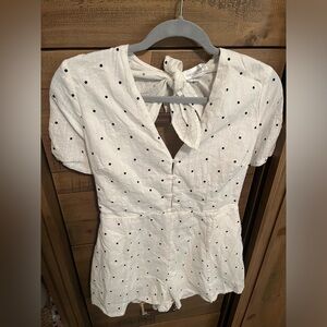 White romper with black polka dots